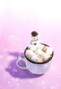 Ceramic mug with hot fresh cocoa drink and melted handmade marshmallow snowman Royalty Free Stock Photo