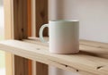The mug has a simple cylindrical shape with a rounded handle Royalty Free Stock Photo