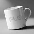 Ceramic mug with smooth finish, featuring debossed letters PLC on its Royalty Free Stock Photo