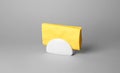 Ceramic napkin holder with paper serviettes Royalty Free Stock Photo