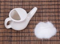 Ceramic neti pot and sea salt Royalty Free Stock Photo