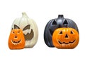 Ceramic Orange, White, and Black Halloween Pumpkin Lanterns with Evil Ghost and Skull Faces on Transparent Background Royalty Free Stock Photo