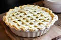 ceramic pie dish with lattice pastry top ready to bake Royalty Free Stock Photo