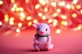 Plastic pink pig on a background of yellow lights Royalty Free Stock Photo