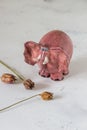 Ceramic pink elephant. Handmade figure of elephant