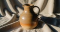 A ceramic pitcher with a smooth, Royalty Free Stock Photo