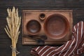 Ceramic plate, pottery crockery, kitchen utensils, cutting board, rustic kitchen Royalty Free Stock Photo