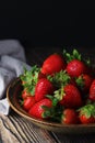 A bowl with ripe bright strawberry