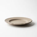 Ceramic plate with a simple minimalist design against a plain white Royalty Free Stock Photo