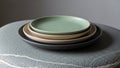 Ceramic plates of different sizes and colors are placed on a text Royalty Free Stock Photo