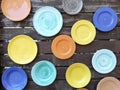 Ceramic plates hanging on the wooden wall Royalty Free Stock Photo