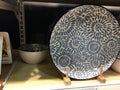 Ceramic plates with pattern on shelf in a store Royalty Free Stock Photo