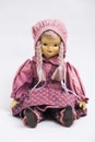 Ceramic porcelain handmade doll in pink vintage clothes