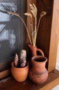 Ceramic pots on the windowsill Royalty Free Stock Photo