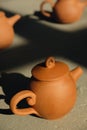 Ceramic pottery tea pots made from clay drying in the sun Royalty Free Stock Photo