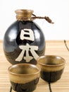 Ceramic Sake Bottle and Cups Royalty Free Stock Photo