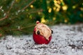 Ceramic Santa Claus on a small snow-covered wood surface Royalty Free Stock Photo