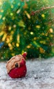 Ceramic Santa Claus on a small snow-covered wood surface Royalty Free Stock Photo