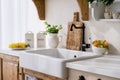 ceramic sink and water tap in retro style at kitchen Royalty Free Stock Photo