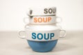 Ceramic Soup Bowls Stacked With Word SOUP On Them Blue in Front