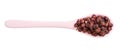 Ceramic spoon with dry schisandra fruits isolated