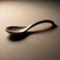 A ceramic spoon rests on a Royalty Free Stock Photo