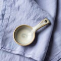 A small ceramic measuring spoon with Royalty Free Stock Photo