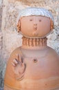 Ceramic statue.