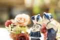 Ceramic Statues Boys and girls kissing each other flower decoration with copy space. Celebration Saint Valentine Day Royalty Free Stock Photo