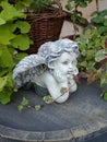 Ceramic statuette in the garden