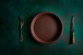 Ceramic tableware pottery plate on grungy Royalty Free Stock Photo