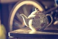 Ceramic teapot, ceramic cup on the wooden table Royalty Free Stock Photo
