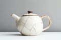 Ceramic teapot with rustic charm and unique cracks. Generative AI
