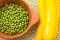 Ceramic terracota bowl of fresh organic green peas Royalty Free Stock Photo