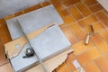 Ceramic tile installation site with its tools Royalty Free Stock Photo