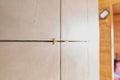 Ceramic tiles on wall with plastic spacers showing installation process and interior renovation work in bright home environment Royalty Free Stock Photo