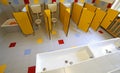 Ceramic toilets and sinks in the bathroom of the kindergarten