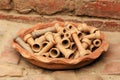 Ceramic tray with cups for hookahs. Bhaktapur, Nepal