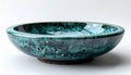 Ceramic Turquoise Bowl with Speckled Glaze on White Background Royalty Free Stock Photo