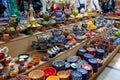 Ceramic Uzbek souvenir painted tea sets and handmade plates at the bazaar. Traditional national art. April 29, 2019