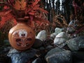 Ceramic vase in an autumn forest