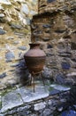 Ceramic vat against the wall Royalty Free Stock Photo