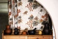 Ceramic ware on the cupboard in the kitchen