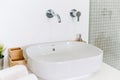 Ceramic Water tap sink with faucet with soap and towel in expensive loft bathroom or kitchen Royalty Free Stock Photo