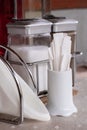 Ceramic white toothpicks holder on restaurant table