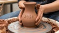 Ceramicist Centering Clay on Pottery Wheel with Year \'2026\' Royalty Free Stock Photo