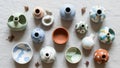 Between the ceramics are small dried flowers adding a natural Royalty Free Stock Photo