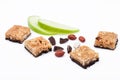 Cereal bar bits apple chocolate and peanuts Royalty Free Stock Photo