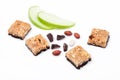 Cereal bar bits apple chocolate and peanuts Royalty Free Stock Photo