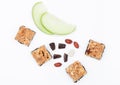 Cereal bar bits apple chocolate and peanuts Royalty Free Stock Photo